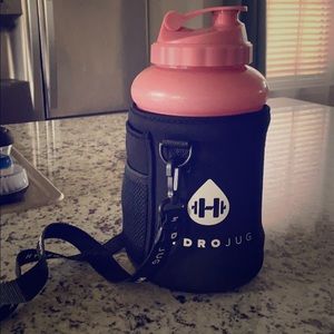 2 HYDROJUG water bottles with covers & straps.